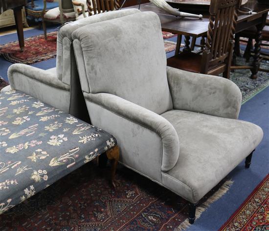 A pair of Howard-style armchairs